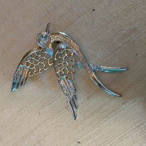 Bird brooch